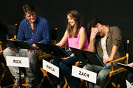 Actors including Alison Brie (third from left) read before an audience at a Black List Live! event.