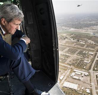Image: Secretary of State John Kerry looks out over Baghdad