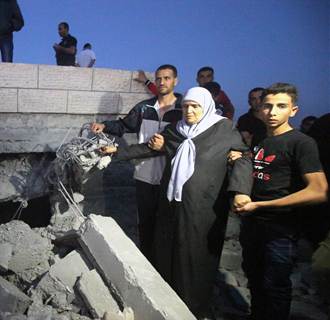 Image: Israeli army blows up Palestinian home in Halhoul of mastermind of Israeli teen kidnappings