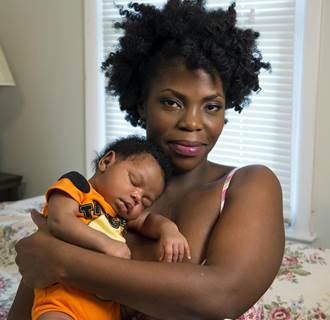 Image: Cemetria Graham with newborn son Jayce ay Sheltering Grace Ministry, a home for homeless pregnant women and new mothers in Marietta, GA