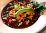 Chefs' Secrets is highlighting the Country-Style Black Bean Soup with Cilantro Pesto at Frederick’s Bistro.
