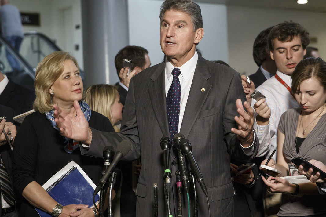 Sen. Joe Manchin, D-W. Va., speaks to reporters at the Capitol in Washington, on Nov. 12, 2014. 