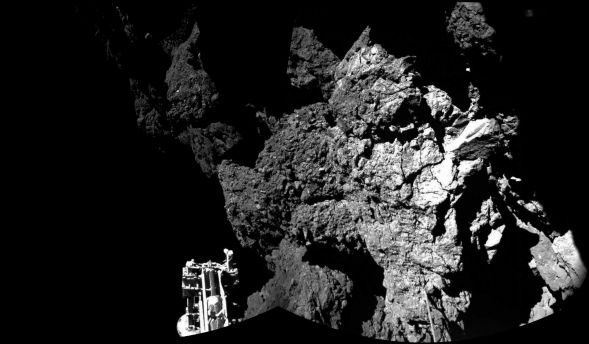 The combination photo of different images  taken with the CIVA camera system  released by the European Space Agency ESA on Thursday Nov. 13, 2014 shows  Rosetta’s lander Philae as it  is safely on the surface of Comet 67P/Churyumov-Gerasimenko,  as  these first  CIVA images confirm. One of the lander’s three feet can be seen in the foreground. Philae became the first spacecraft to land on a comet when it touched down Wednesday on the comet, 67P/Churyumov-Gerasimenko.