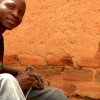 William Kamkwamba works on a motor.