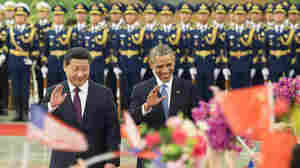 Chinese President Xi Jinping and President Obama, seen here during a ceremony at the Great Hall of the People in Beijing, announced pledges to reduce greenhouse gases.