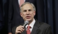 Texas Attorney General Greg Abbott speaks during a news conference with Gov. Rick Perry in the Governor's press room, Monday, July 21, 2014, in Austin, Texas. Gov. Perry announced he is deploying up to 1,000 National Guard troops over the next month to the Texas-Mexico border to combat criminals that Republican state leaders say are exploiting a surge of children and families entering the U.S. illegally.  (AP Photo/Eric Gay)