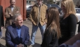 In this Feb. 18, 2014 file photo Texas gubernatorial candidate Greg Abbott, left, visits with supporters during a stop in Denton, Texas, to promote early voting with Rocker Ted Nugent, wearing cowboy hat, center. (AP Photo/The Dallas Morning News, Ron Baselice)