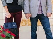 Couple holding hands at Shop at Park Lane