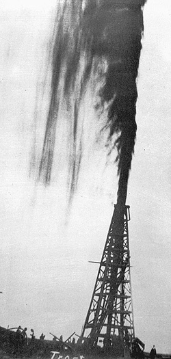 Spindletop blows in.
