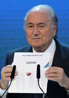 FIFA President Sepp Blatter holding up the name of Qatar during the official announcement of the 2022 World Cup host country at the FIFA headquarters in Zurich, in Dec. 2010.