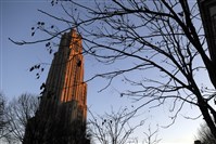  The sun sets over the Cathedral of Learning in Oakland. At the University of Pittsburgh, the base yearly in-state tuition as of this fall is $16,872.