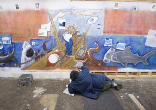 The central figure of the 31-foot-long mural Art/Life is obviously artist Bert Long. Photo: BRETT COOMER, CHRONICLE