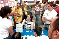  Ximena Diaz Rodriguez, Idea Foundry director of entrepreneurial activities, meets with entrepreneurs during an August event in Mexico City. 