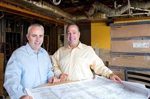  Owner Troy Potteiger, left, and his business partner Ron Sofranko inside the soon to be Circolo restaurant on Carson Street, South Side. 