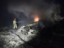 A firefighter sprays water to extinguish a fire, on July 17, 2014, amongst the wreckages of the malaysian airliner carrying 295 people from Amsterdam to Kuala Lumpur after it crashed, near the town of Shaktarsk, in rebel-held east Ukraine. Ukrainian President Petro Poroshenko said on Thursday that the Malaysia Airlines jet that crashed over rebel-held eastern Ukraine may have been shot down."We do not exclude that the plane was shot down and confirm that the Ukraine Armed Forces did not fire at any targets in the sky," Poroshenko said in a statement posted on the president's website. (Photo credit: Alexander KHUDOTEPLY/AFP/Getty Images)