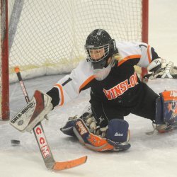 Staff photo by Michael G. Seamans 
 Winslow High School goalie Kiana Richards makes a save during a practice Thursday at Sukee Arena in Winslow.