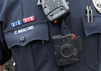 The Tampa Police Department&#8217;s decision to outfit 60 of its officers with body cameras has potential to bring much-needed transparency to the agency. Above, an officer in a Minnesota police department wears a camera.
