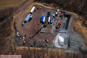 fracking site containment pond overflowing