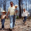 The Gwin family walks through the aftermath of the Labor Day fires.