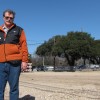 Michael Fossum of the Austin Heritage Tree Foundation stands in front of the heritage Live Oak known as the "Taco Bell Tree." Fossum and his group fought to save the tree from being cut down for a traffic project. Now it's going to be moved across the street.
