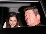 129006, EXCLUSIVE: Robin Thicke leaves with a mysterious girl after attending Leonardo DiCaprio's birthday party at Soho House in Los Angeles. Los Angeles, California - Tuesday NOvember 11, 2014. Photograph: © Devone Byrd, PacificCoastNews. Los Angeles Office: +1 310.822.0419 sales@pacificcoastnews.com FEE MUST BE AGREED PRIOR TO USAGE