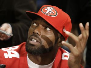 San Francisco 49ers wide receiver Randy Moss talks with reporters on Thursday, Jan. 31, 2013, in New Orleans.