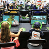 Two youngsters play in a Minecraft tournament Aug. 9 in Ascot, England.