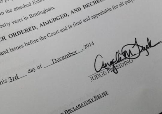 Signature of the presiding judge, re-allocating $2.3
