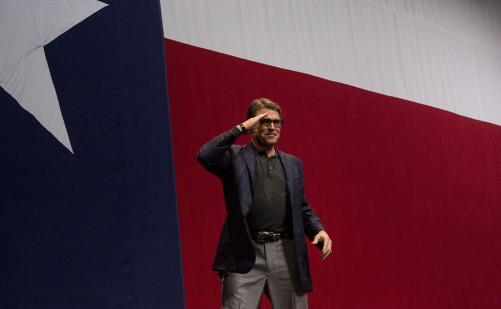 Perry salutes the crowd during Greg Abbott's victory party on election night, 2014.