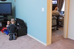 Child Protective Services caseworker Juan Carlos Pacheco rents a spare bedroom in his childhood friend's home in Odessa. He has also lived in a trailer with five other people and a one-bedroom apartment with six other people. His own family lives in El Paso.