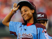 Taney Dragons Pitcher Mo´ne Davis tips her hat as she is introduced and recognized before the game between the Washington Nationals and the Philadelphia Phillies at Citizens Bank Park on August 27, 2014 in Philadelphia, Pennsylvania.