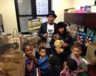 : WBA Middleweight Champion Danny Jacobs, a Brownsville native, returned to his old neighborhood to deliver frozen turkeys and full dinners to families in a Dean St. shelter.