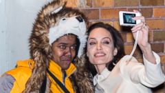 Angelina Jolie Snaps a Selfie with a Fan