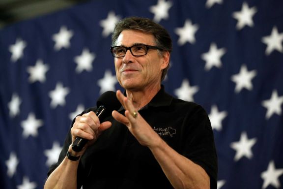 FILE - In this Oct. 24, 2014 file photo, Texas Gov. Rick Perry speaks during a conservative rally in Smithfield, N.C.  On Tuesday, Nov. 18, 2014, a Texas judge refused to quash two felony indictments for abuse of power against Perry on technicalities, ruling that the case against the possible 2016 presidential hopeful should continue.  (AP Photo/Gerry Broome, File)