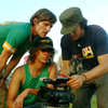 Invisible Children co-founders Jason Russell, left, Bobby Bailey, center, and Laren Poole, record footage in Africa in 2007.