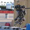 Atlas, a humanoid robot, is competing against 16 other robots in a Pentagon-sponsored contest this weekend.