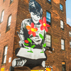 "Flower Power" by Icy and Sot on the back wall of Rochester's Good Luck restaurant.