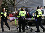 EMTs transport shooting victim rapper Beanie Sigel from a house on Spruce Avenue in Plesantville, Friday Dec. 5, 2014, where he and another man were wounded.