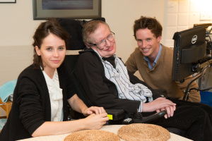 Felicity Jones, Stephen Hawking, and Eddie Redmayne. Photo courtesy of Focus Features.