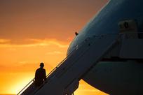 President Barack Obama boards Air Force One at Yangon International Airport on Friday, Nov. 14, 2014, in Yangon, Myanmar, for the G-20 summit in Brisbane, Australia. 