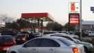 Cars line up at the Fas Stop at at Vance Jackson Road and Spicewood Drive near Loop 410, where gasoline was selling for under $2.00 Friday.