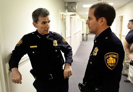 Metro daily - San Antonio Police Chief William McManus, left, chats with Deputy Chief Anthony Trevino Jr., after McManus promoted him to the new position, at SAPD Headquarters. Friday, September 30, 2011. Photo Bob Owen/rowen@express-news.net Photo: BOB OWEN, SAN ANTONIO EXPRESS-NEWS / rowen@express-news.net