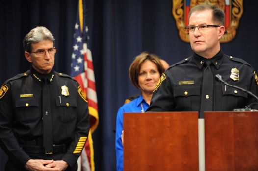 Deputy Chief Anthony Treviño speaks during a press conference after being named interim San Antonio police chief effective in January on Friday, Dec. 5, 2014. City manager Sheryl Scully, middle, and current police chief William McManus, left, listen. Photo: Billy Calzada, San Antonio Express-News /  San Antonio Express-News