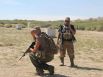 Photos showing dozens of members of the militia groups on the U.S.-Mexico border carrying semi-automatic rifles and wearing masks, camouflage and tactical gear provide one of the first glimpses into the group's activities on the border.