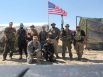 Photos showing dozens of members of the militia groups on the U.S.-Mexico border carrying semi-automatic rifles and wearing masks, camouflage and tactical gear provide one of the first glimpses into the group's activities on the border.