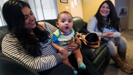 Parent Educator Michelle Alvarado (right) visits with teen mother Amberlynn Trejo (left) and her seven-month-old son, Aaron Medina, Jr. The Children's Shelter program, Teen HOPES, provides teen mothers with the skills and guidance they need to raise their newborn babies. The purpose of the program is to prevent child abuse according to Alvarado who works with teen moms in San Antonio. Alvarado was recently with Trejo and her seven-month old son, Aaron Medina, Jr. and Trejo's friend, Amanda Apolinar, who is also a teen mother with an eight-month-old girl, Gabrielle. Both moms and their children were working with Alavardo on the children's motor skills. (Kin Man Hui/San Antonio Express-News)