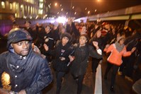  Protesters march off the Parkway East via the Grant Street exit on their way to the South Side.