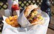 Just try to eat The Junkyard burger without a knife and fork.