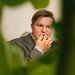 Seen through tobacco plants, Patrik Hildingsson sampled a pouch of snus, a discreet cousin of chewing tobacco. He is an executive at Swedish Match, which wants the United States government to declare snus to be less harmful than cigarettes.