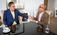 Elton John and Darren Walker discussing childhood dreams and adult realities at the Four Seasons Hotel in Washington.